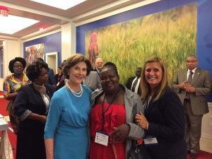 First Lady Laura Bush. Khanyisile, and m2m Co-founder Robin Smalley